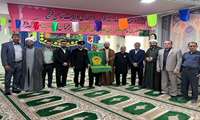 تجلیل از خانواده شهید اسفندیاری در جشن ولادت امام رضا (ع)